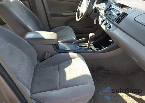 2003 Toyota Camry Le from USA, damaged, VIN 4T1BE32KX3U181028